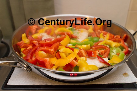 The Cooks Standard pan dropped like a rock in temperature when we threw in a couple of chicken breasts, steaming them instead of frying them. We added the veggies later. Cooks Standard 12 inch skillet with lid
