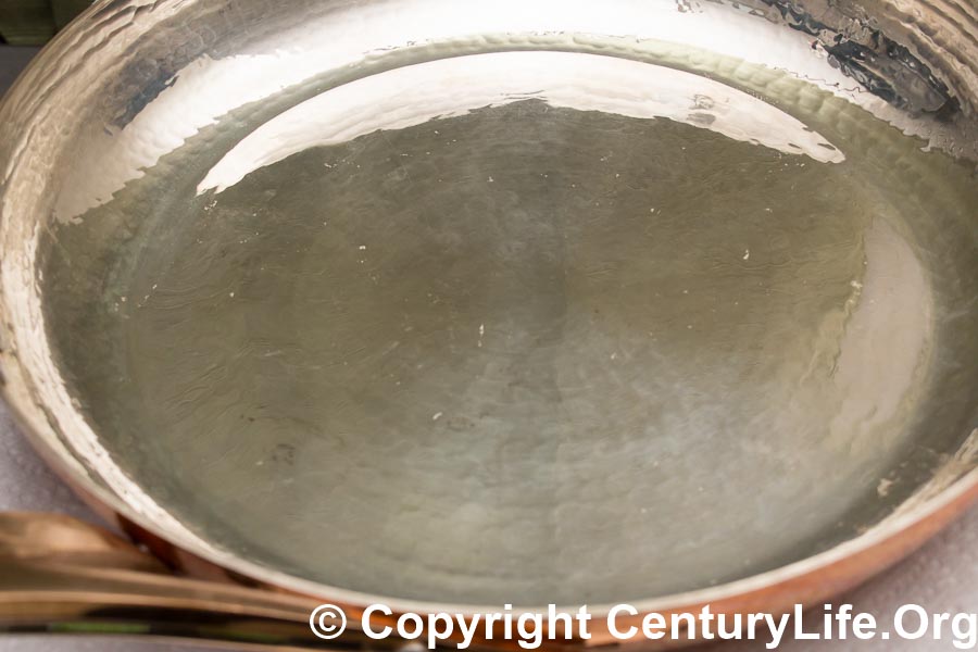 This copper pan is lined with a thin layer of silver